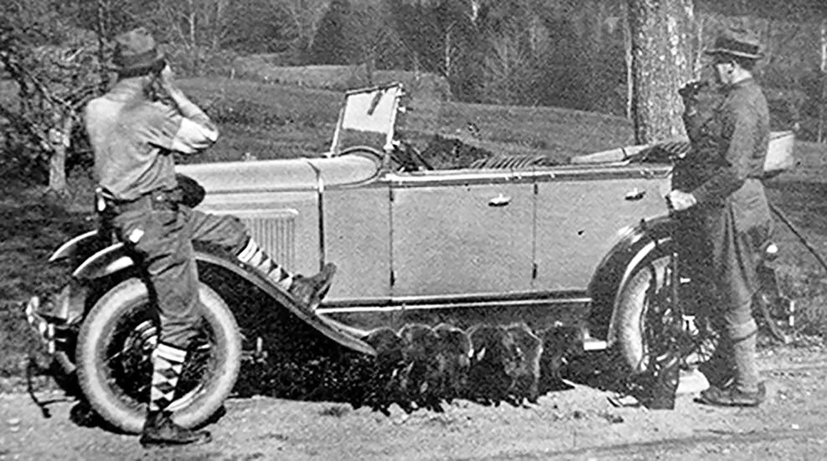 In 1929, Colonel Townsend Whelen, at right with friend Paul Estey, used custom rifles in 22 Hornet on the 1922 Springfield action to bag the six woodchucks shown here placed on the running board of their automobile for photographing. Whelen was  instrumental in the introduction of 22 Hornet ammunition by Winchester and Estey authored The Woodchuck Hunter, one of the first books published on the subject.